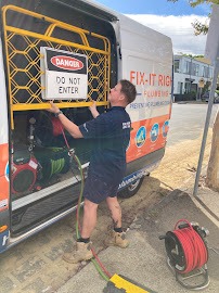 Plumber working on water pressure issue